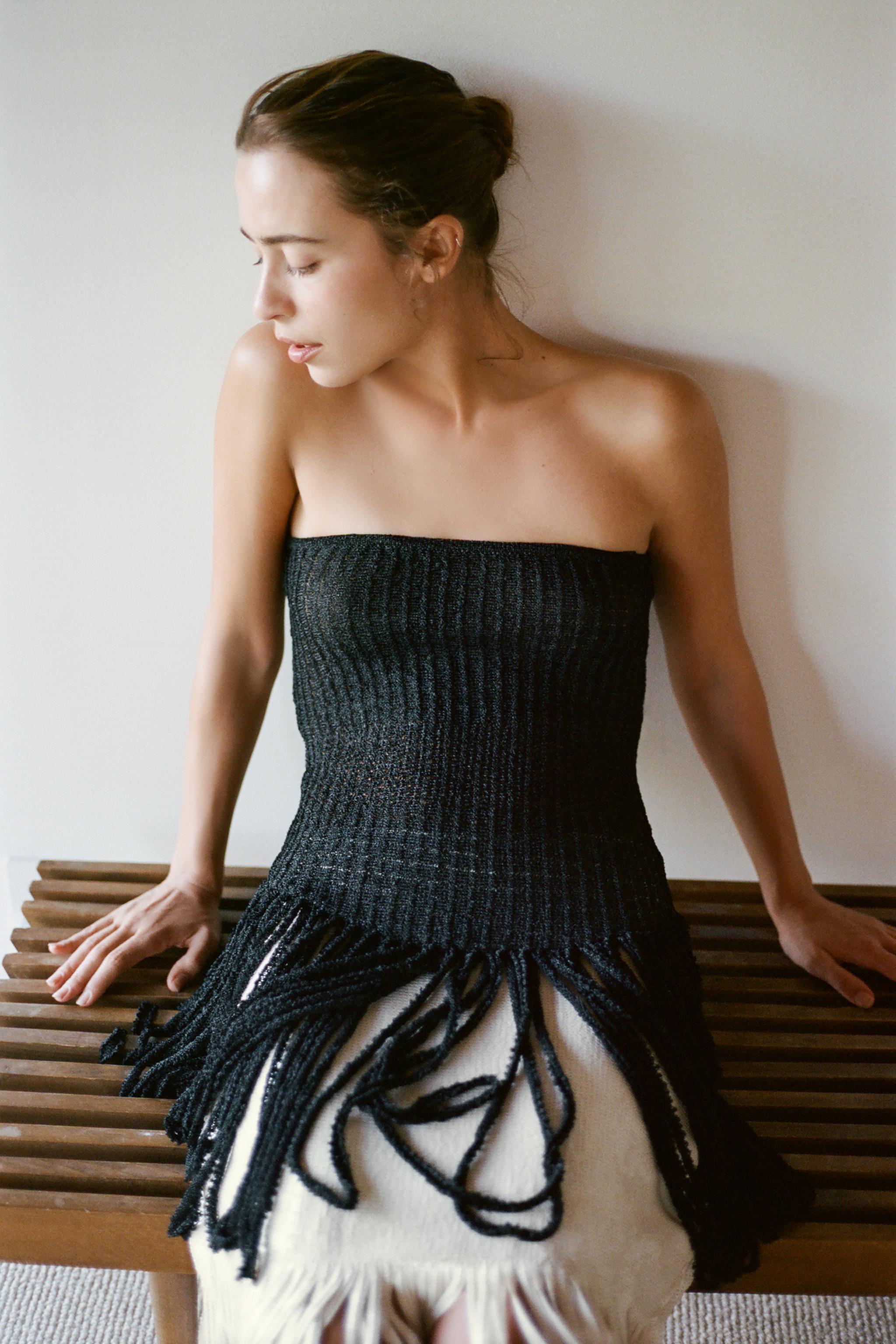 FRINGED STRAIT-ACROSS KNIT TOP