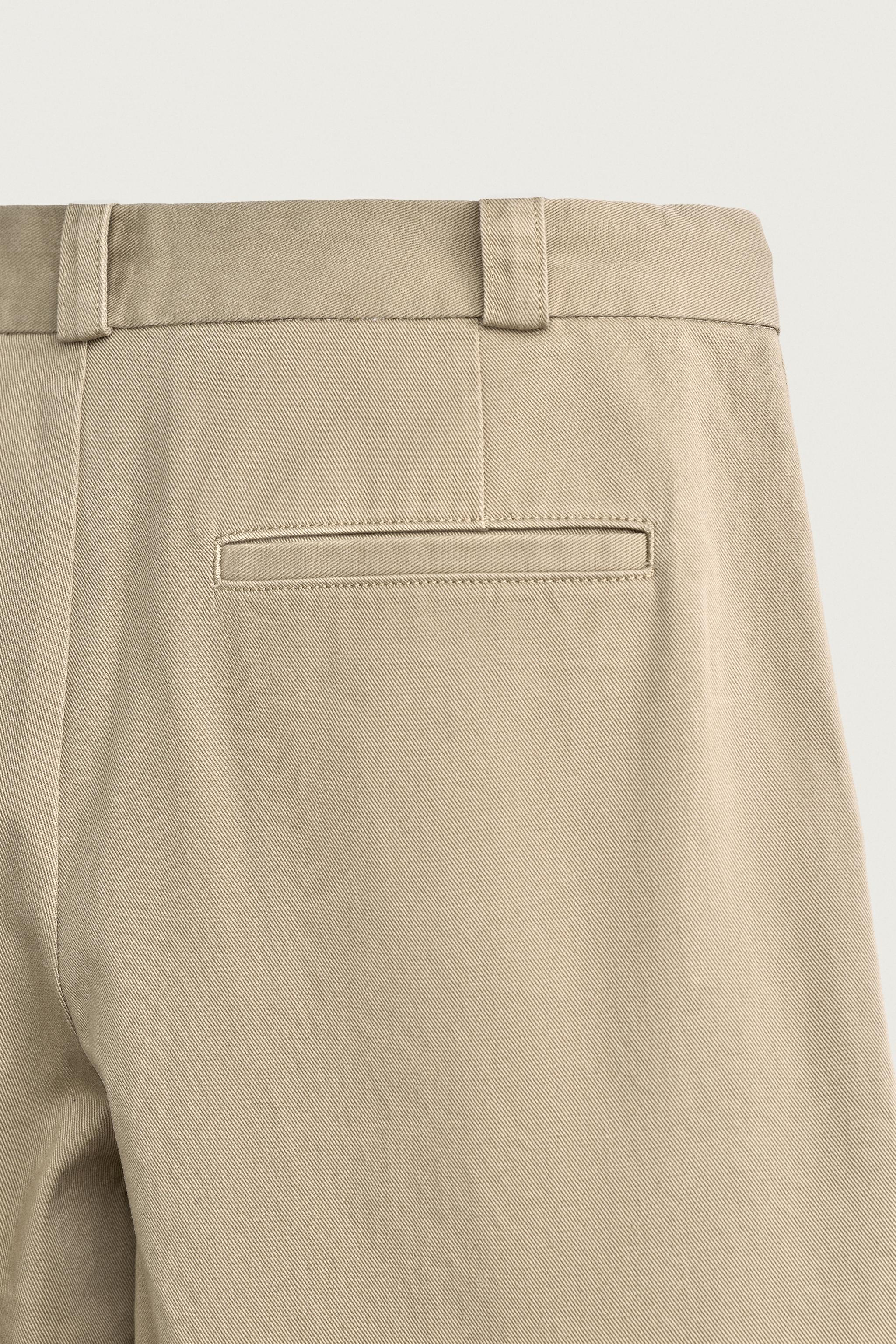 PLEATED STRAIGHT-FIT CHINO PANTS