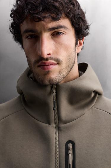 ТЕХНІЧНА ТОЛСТОВКА З КАПЮШОНОМ НА БЛИСКАВЦІ - Пісочний Zara