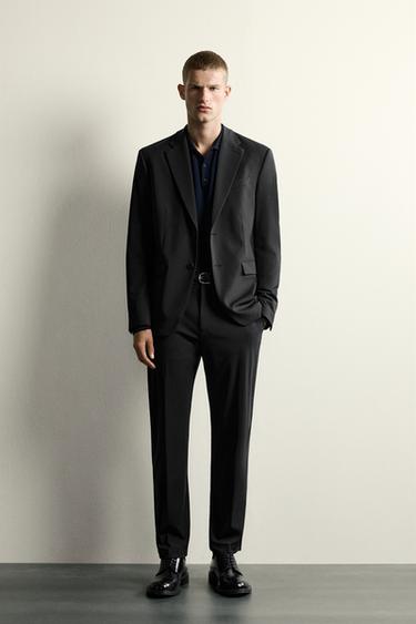 بنطلون بدلة مريح بقصة ضيقة - أسود by Zara