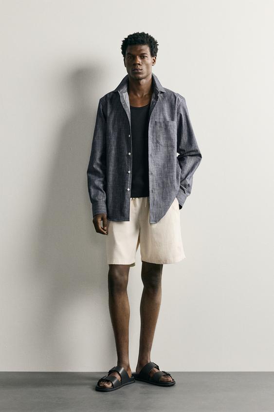 CAMISA REGULAR FIT BOLSILLO - Índigo de Zara - Imagen 0