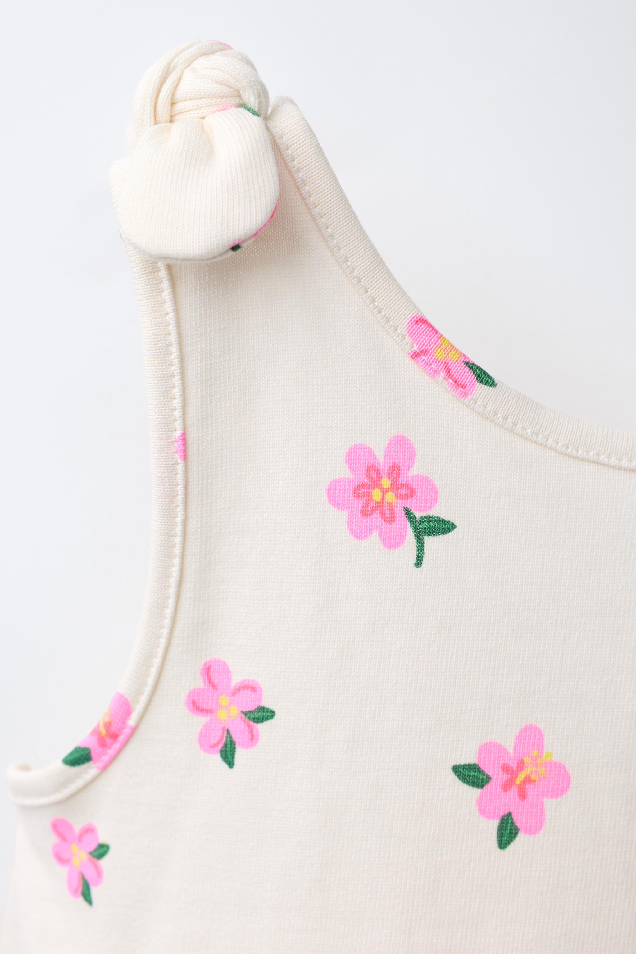 SHORT FLORAL JUMPSUIT