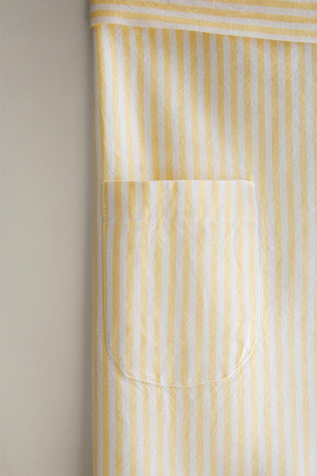 STRIPED APRON WITH RUFFLE TRIM — Yellow