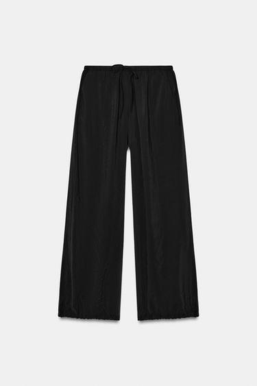 PANTALÓN FLUIDO BAJO AJUSTABLE - Negro de Zara - Imagen 0