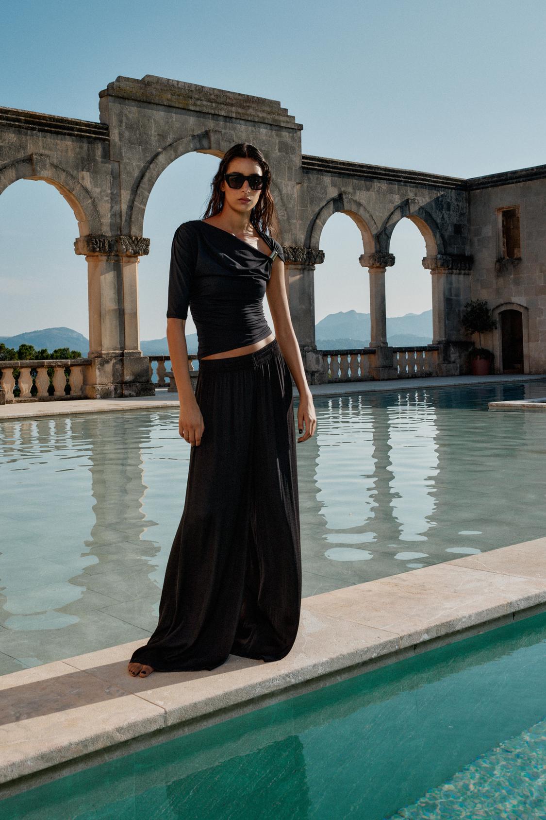 WIDE FLOWING TROUSERS