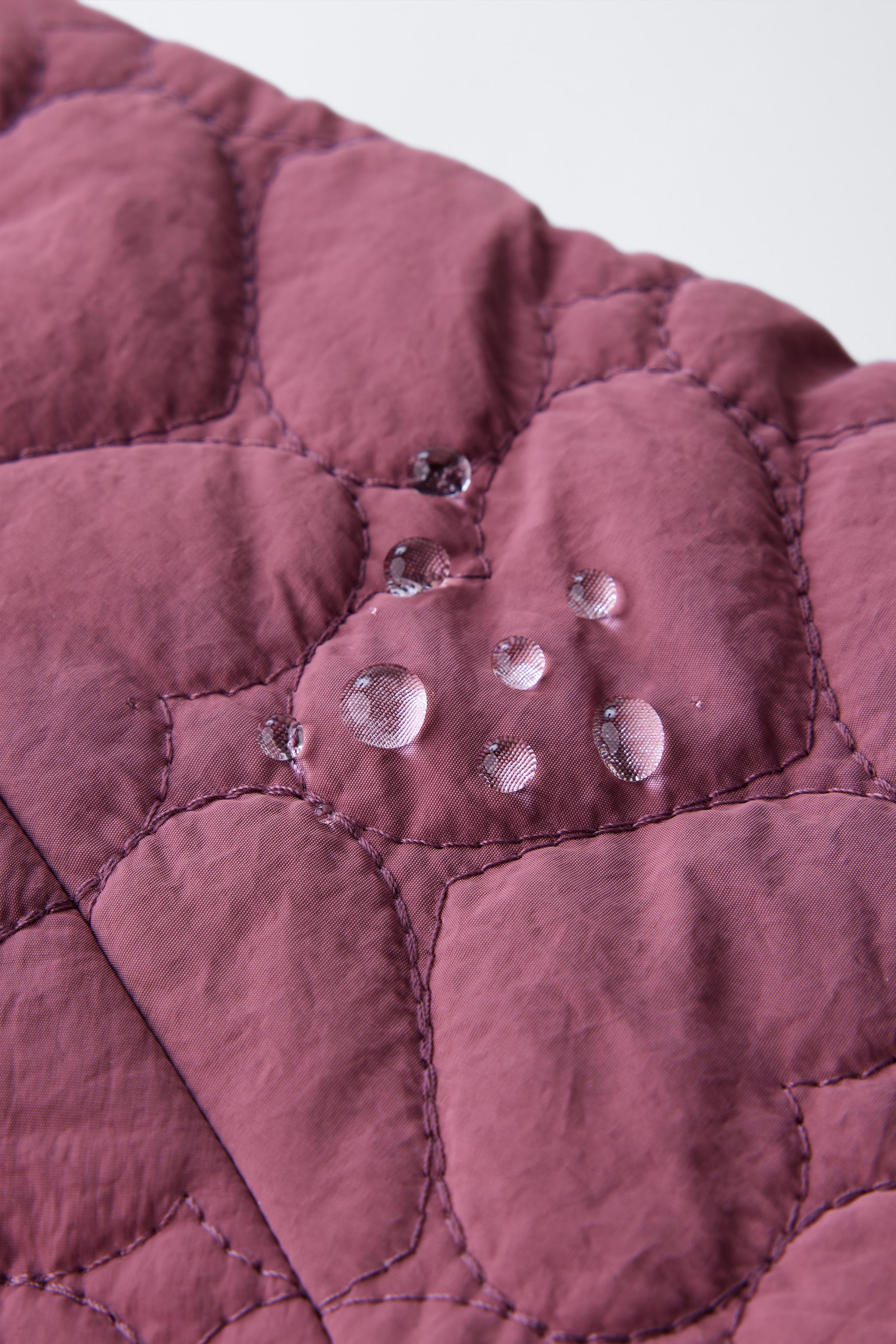 VESTE MATELASSÉE ÉTIQUETTE DÉPERLANTE