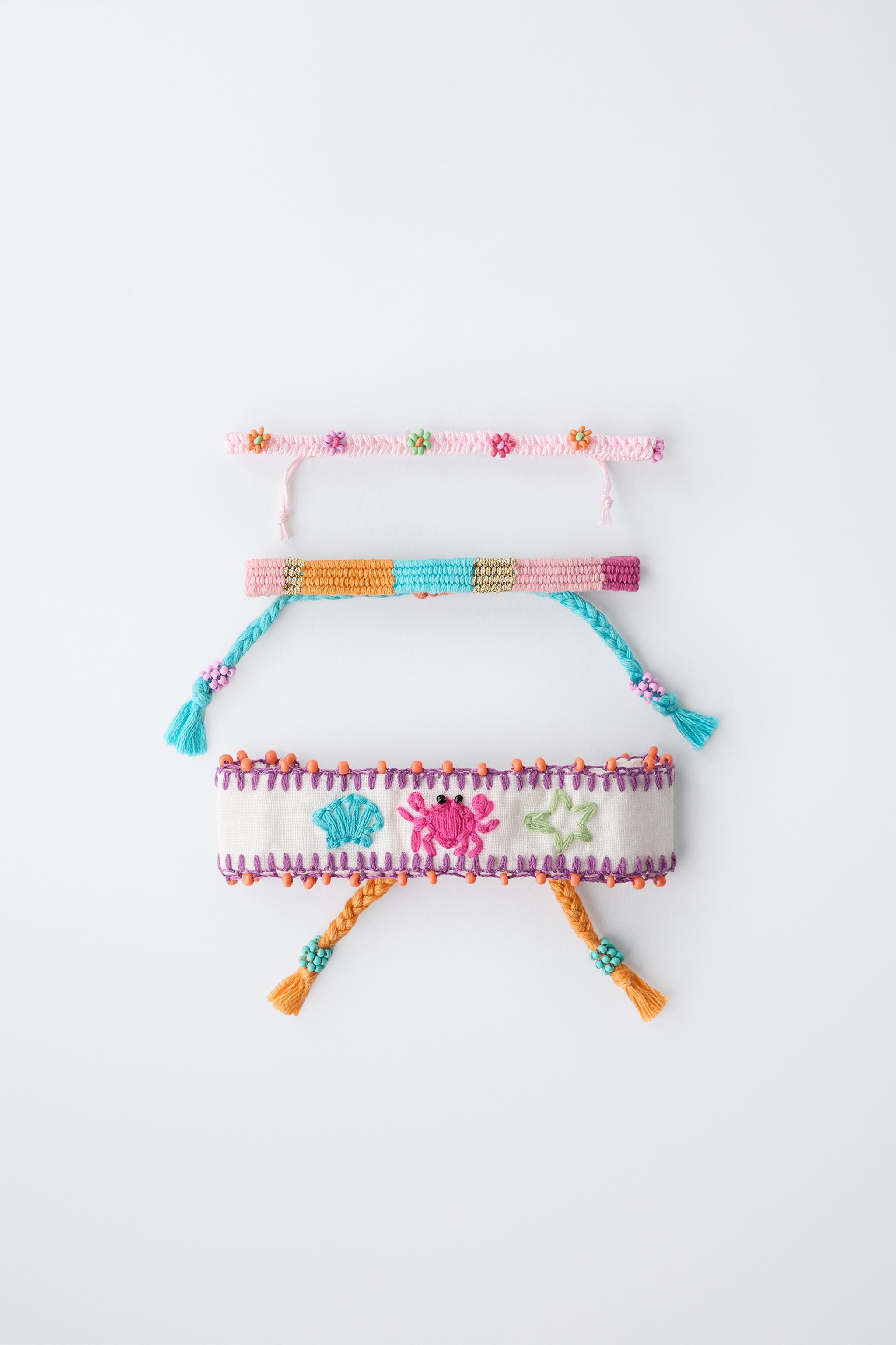 THREE-PACK OF EMBROIDERED AND BEADED BRACELETS