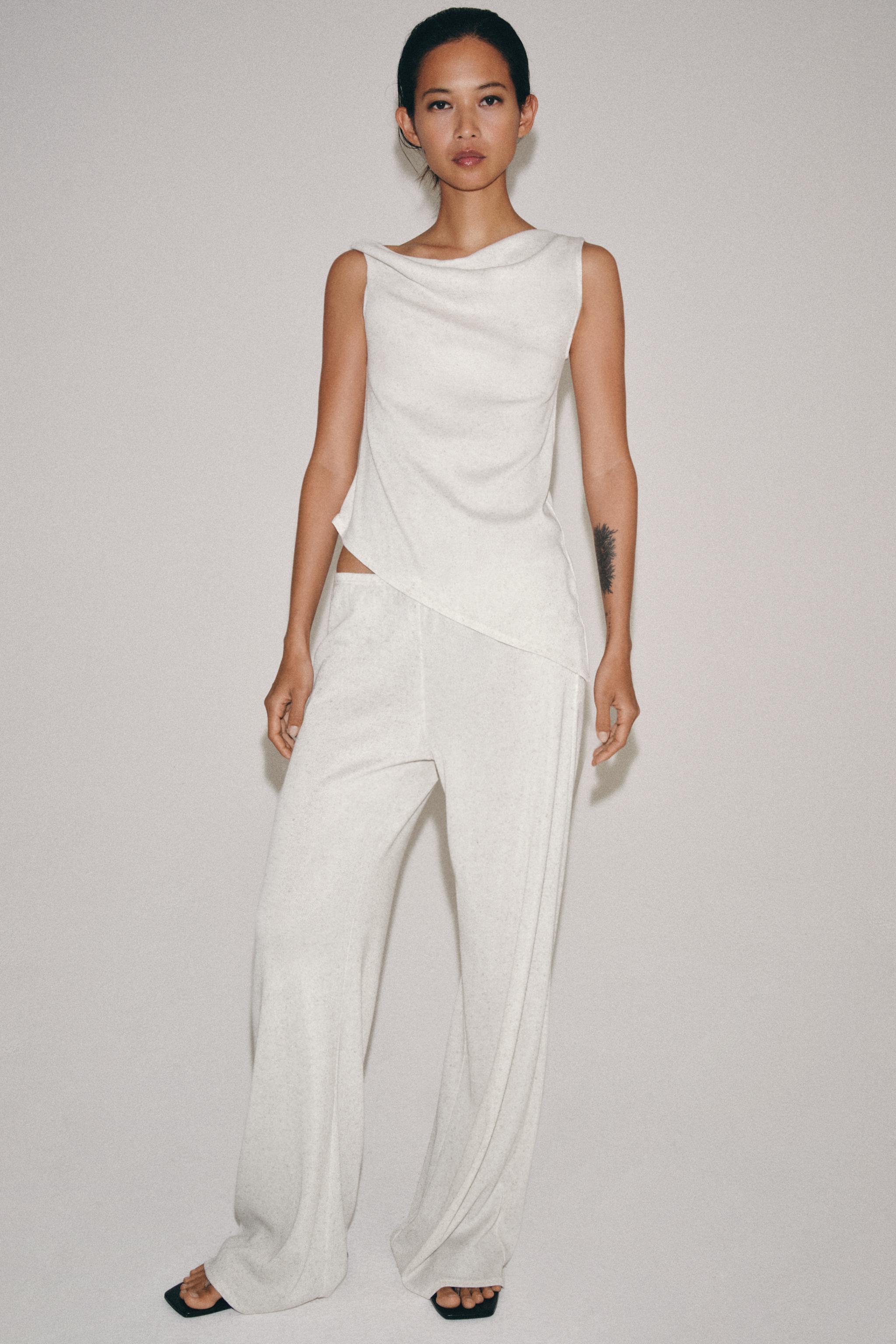 ASYMMETRIC RUSTIC TOP