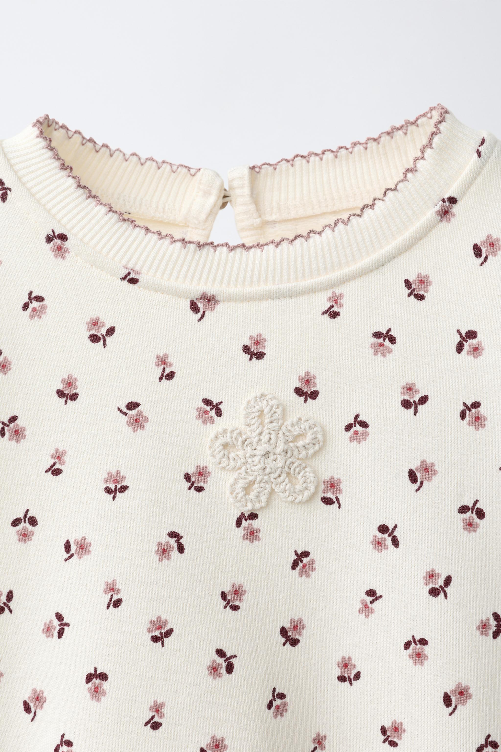 FLORAL PRINT SWEATSHIRT
