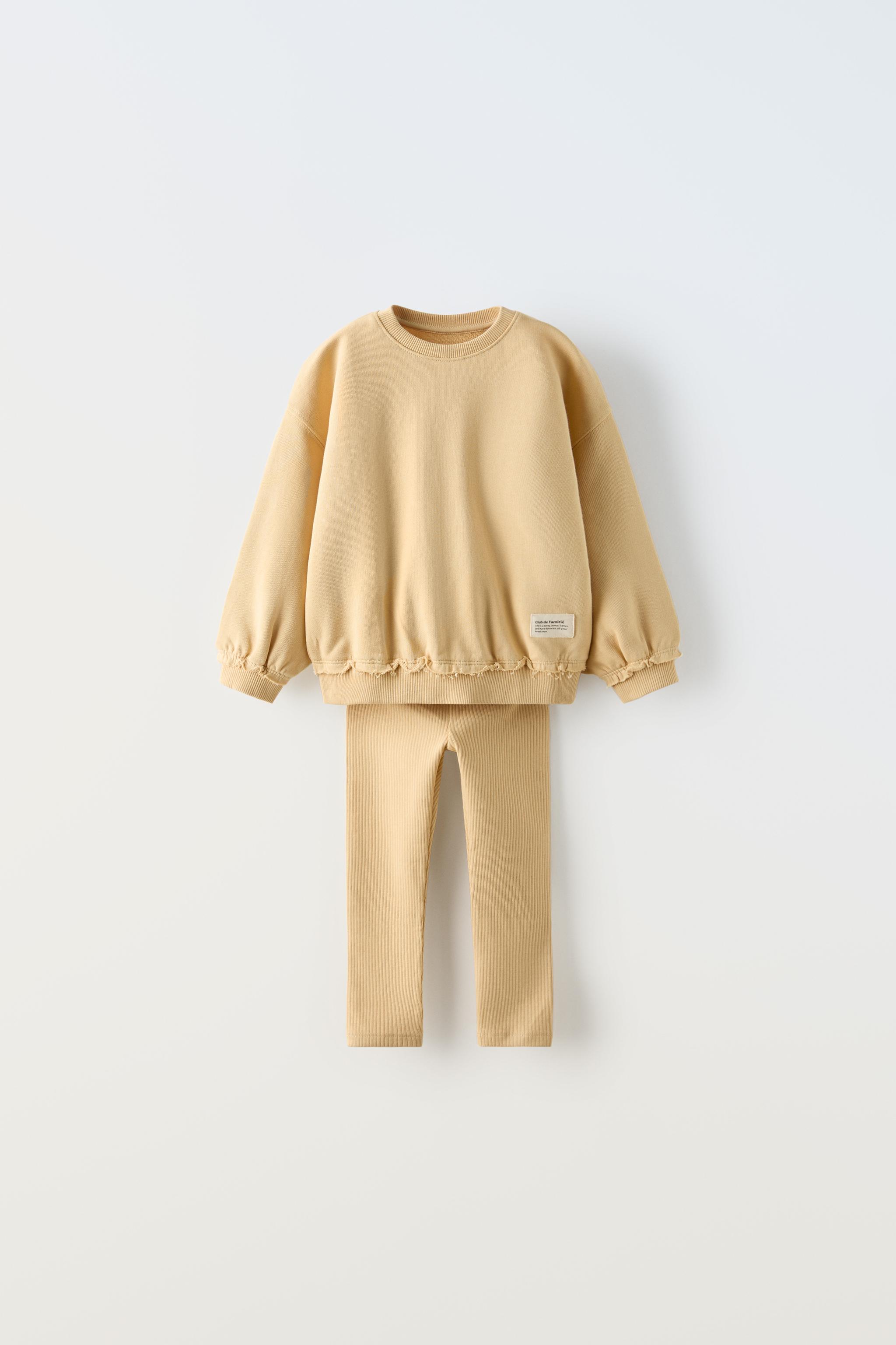 Zara offers garment dye sweatshirt and ribbed leggings set. Size 9-12