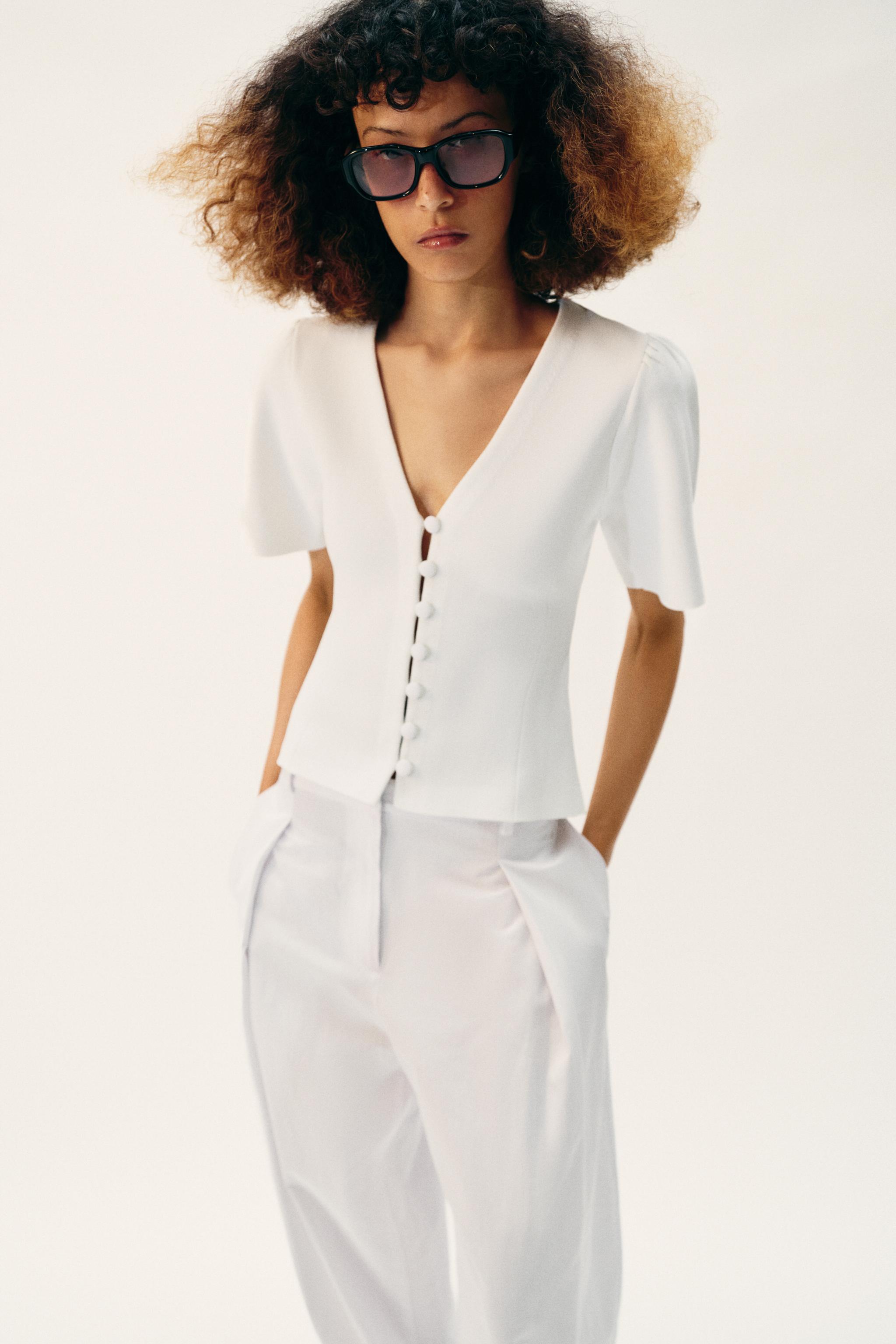 GILET EN MAILLE MANCHES COURTES