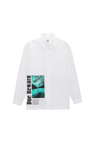 White shirt with "Due Reward" text and blue landscape photo. Additional text: "1. Belong to no one. 2. Regret nothing. 3. Paint the silence. 4. Push boundaries."
