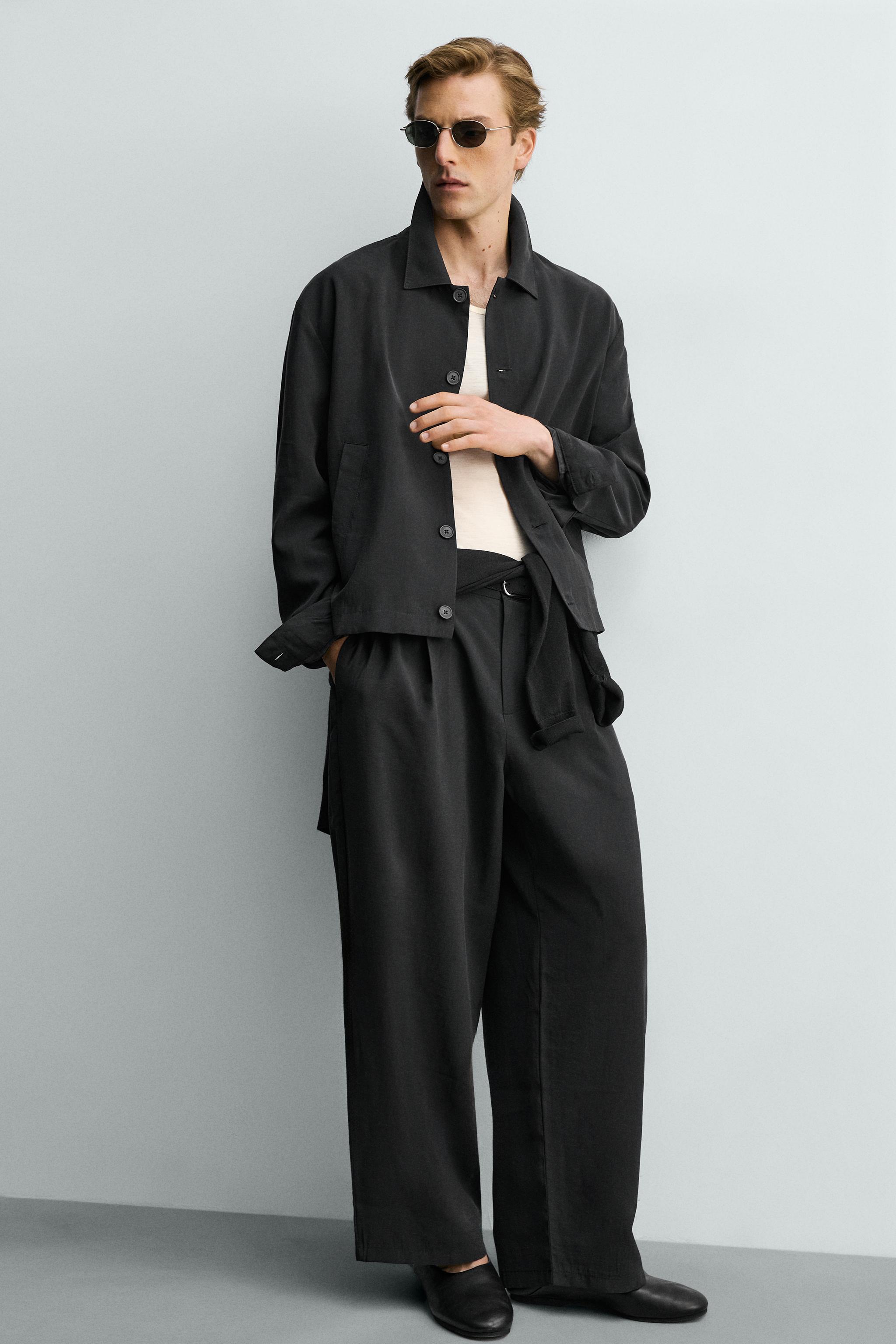 FLOWY PLEATED PANTS