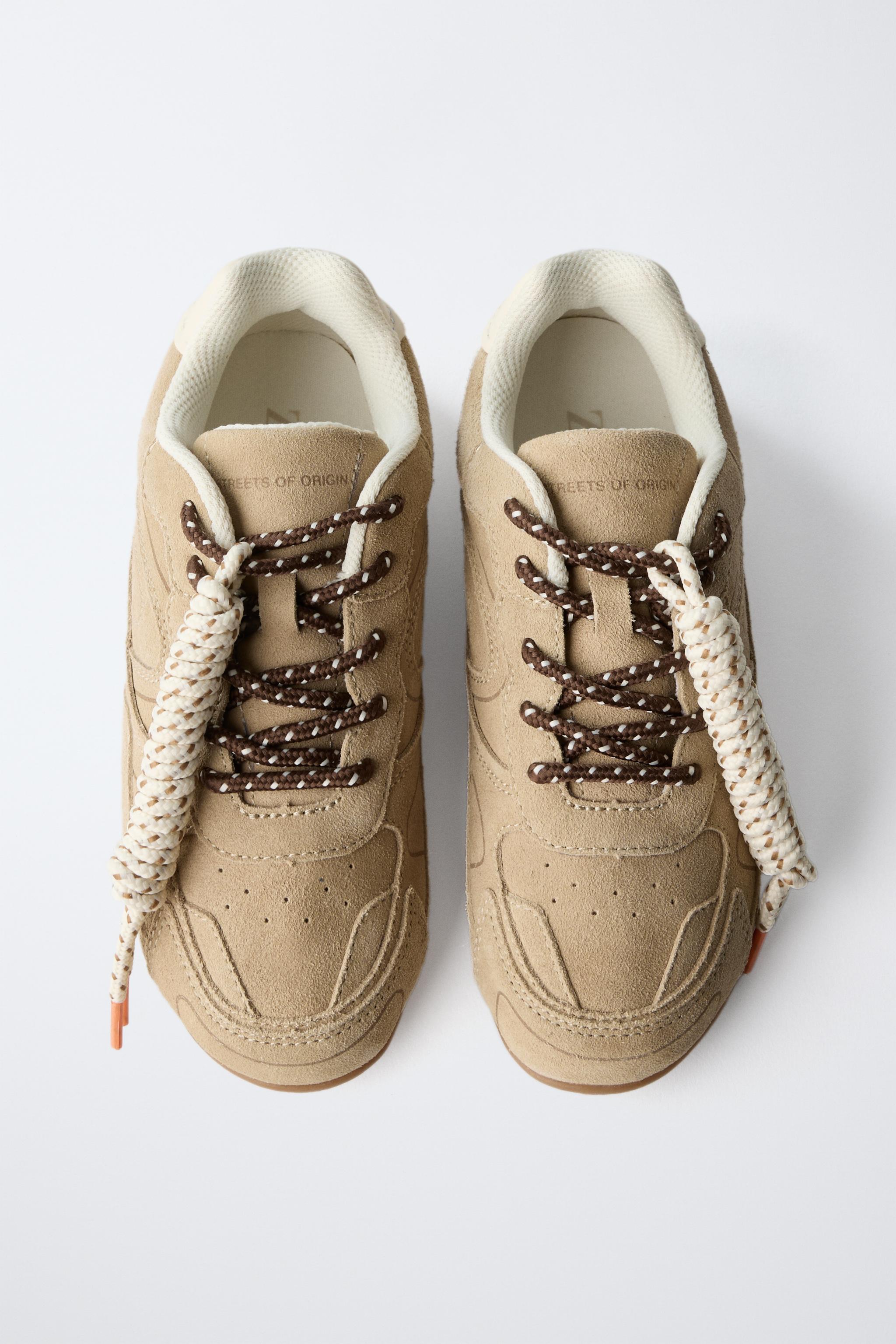 TENNIS EN CUIR À LACETS
