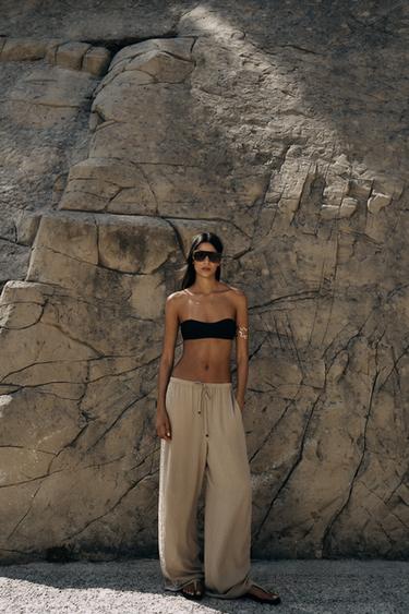 БРЮКИ С ШИРОКИМИ ШТАНИНАМИ И ВЫШИВКОЙ ПО БОКАМ — ПЕСОЧНЫЙ от Zara