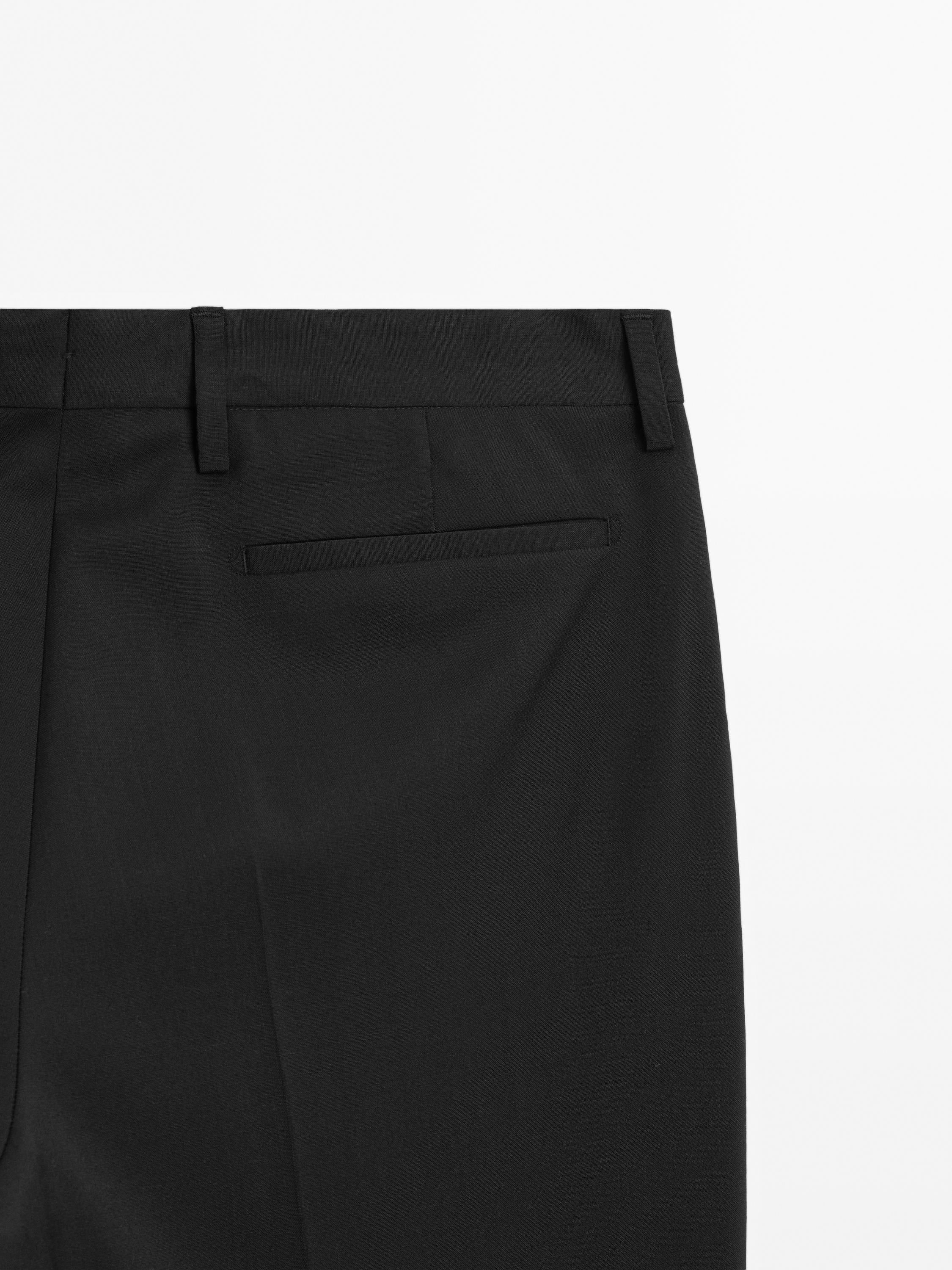 Pantalon de costume uni 100 % laine