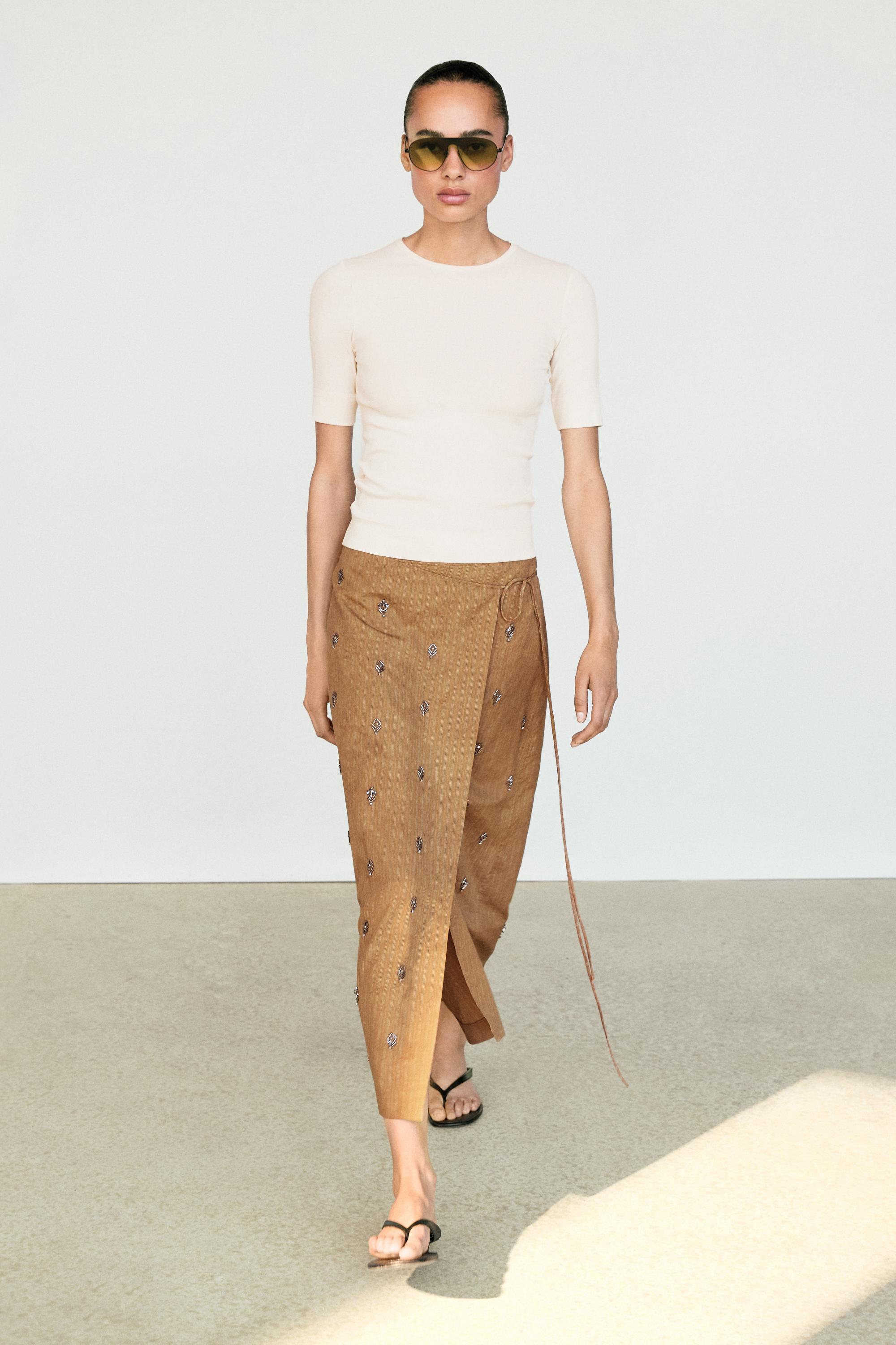 Midi pareo skirt with appliqués