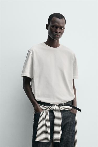 ΜΠΛΟΥΖΑ ΜΕ ΓΡΑΦΙΚΟ ΑΝΑΓΛΥΦΟ - Λευκό του Zara