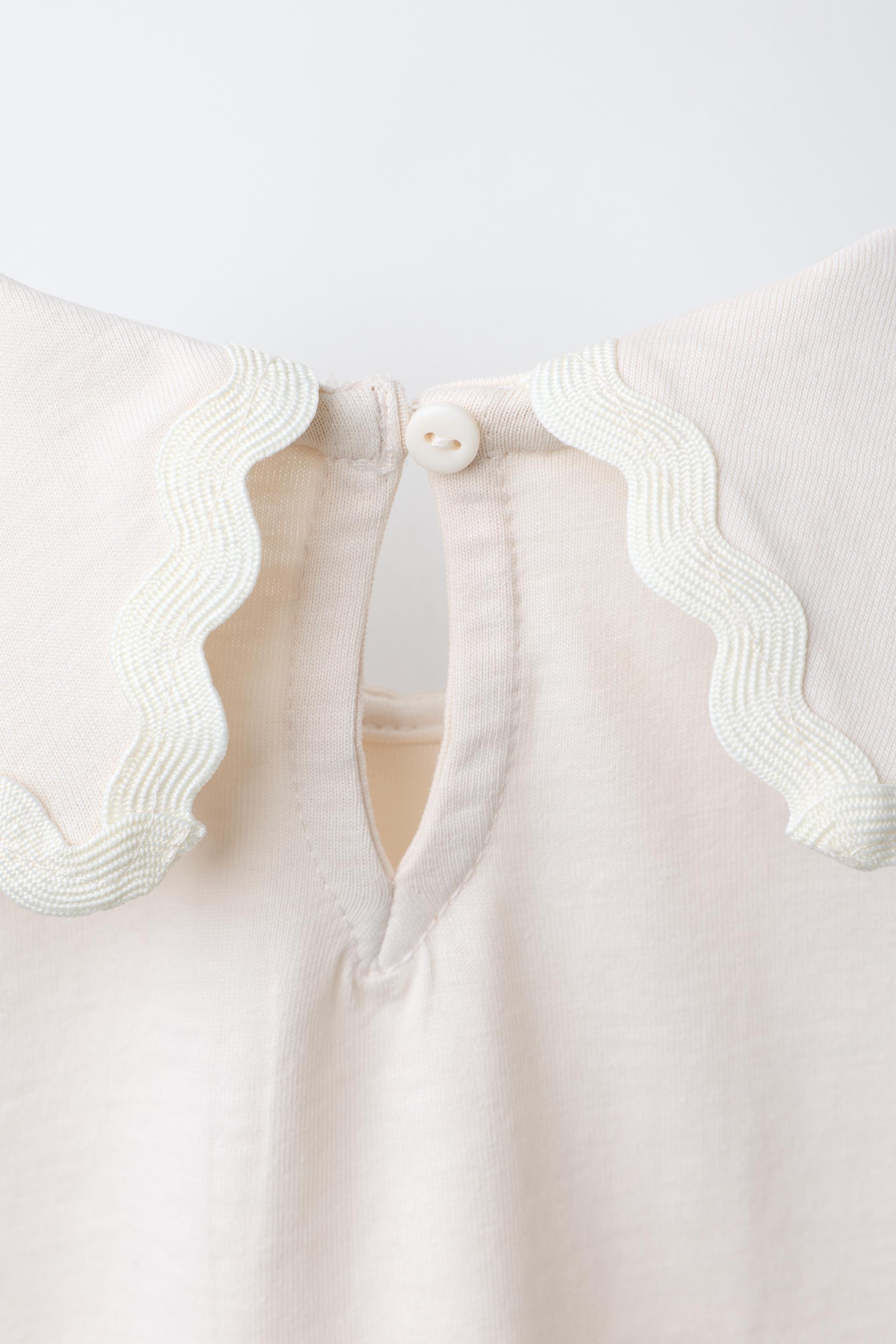 PETER PAN COLLAR TOP WITH RIPPLE TRIM