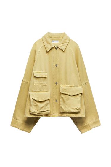 Front view of a yellow jacket with large front pockets and silver buttons.