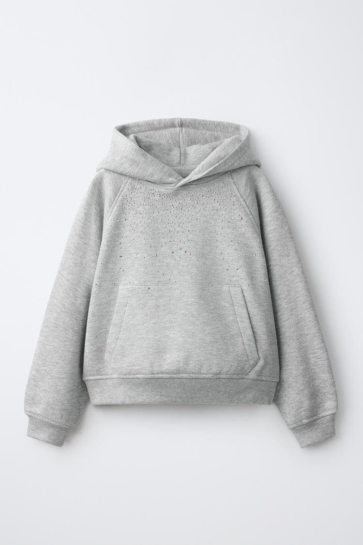 Sudadera capucha aplique strass