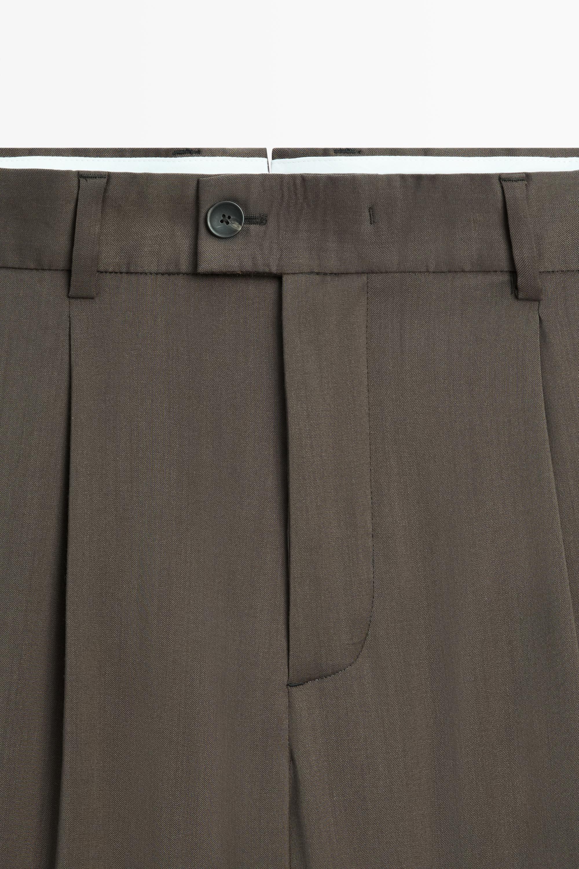 Pantalon relaxed fit à pinces 100 % laine froide