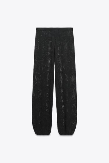 PANTALÓN PUNTO ESTRUCTURA FLORES - Negro de Zara