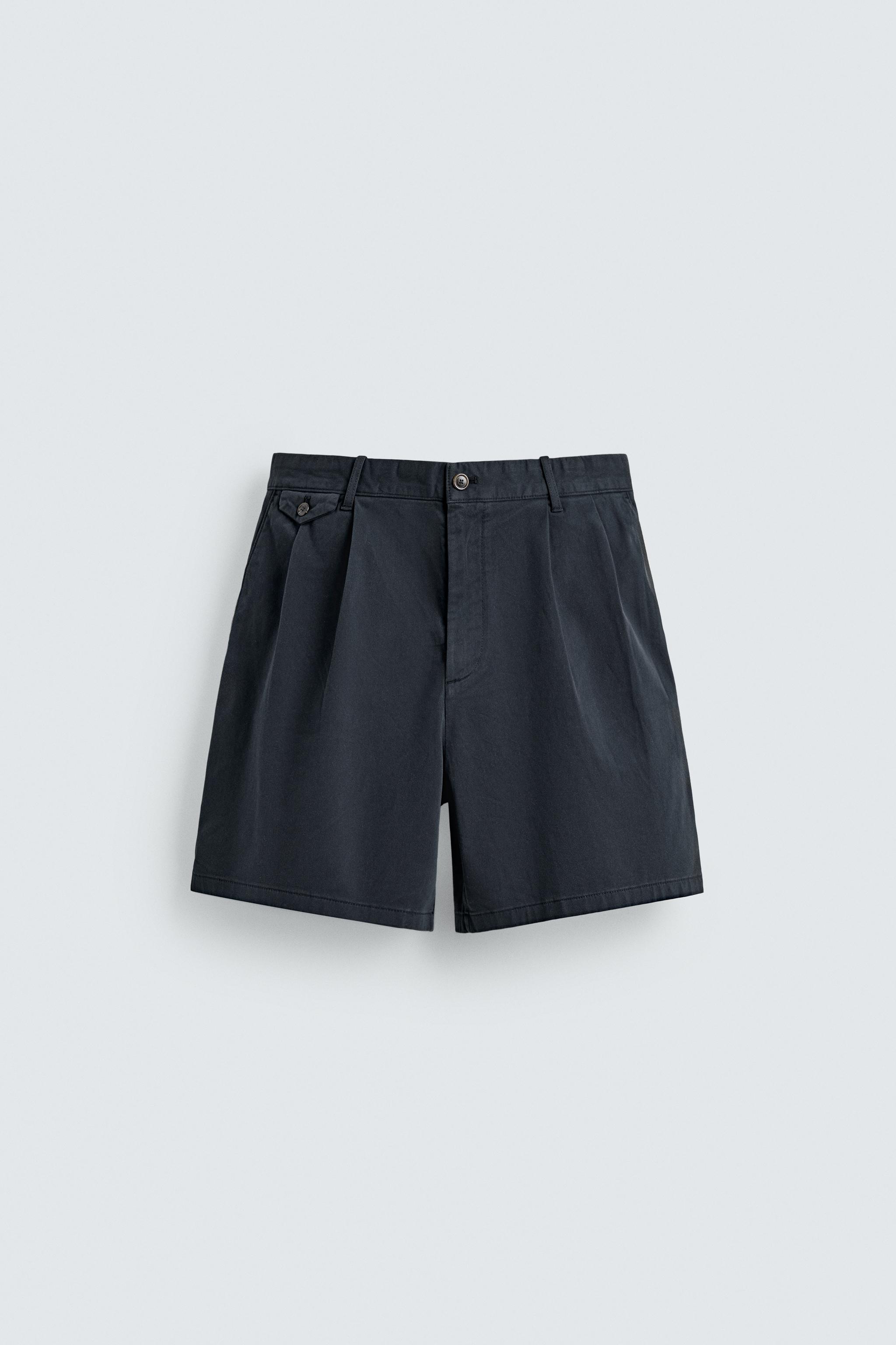 REGULAR FIT PLEATED CHINO SHORTS