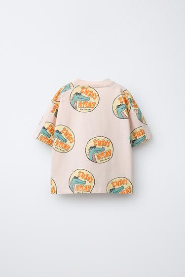 T-SHIRT À IMPRIMÉ DINOSAURES - Rose clair de Zara - Image 1