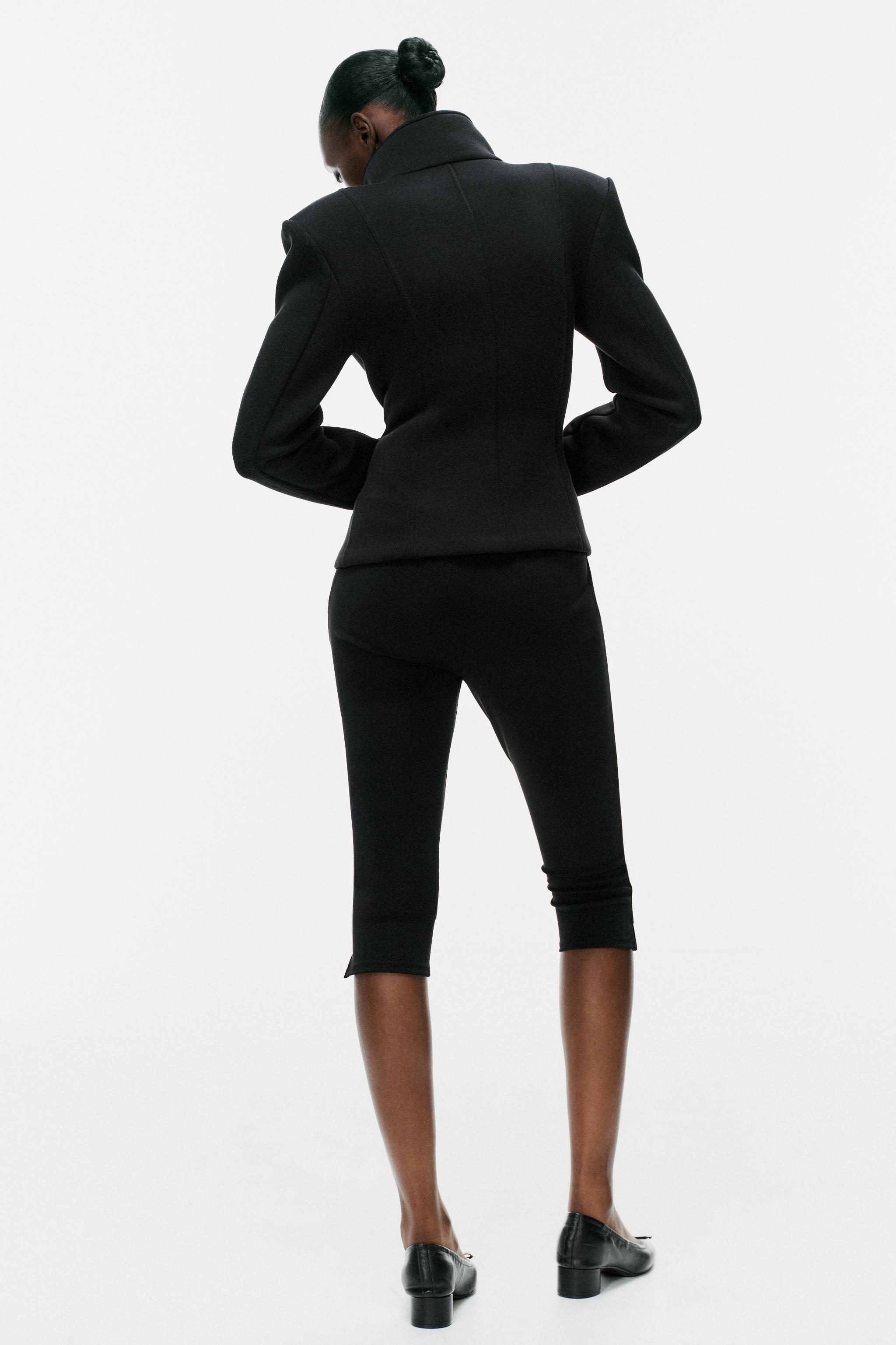CAPRI PANTS WITH FLAP DETAILS