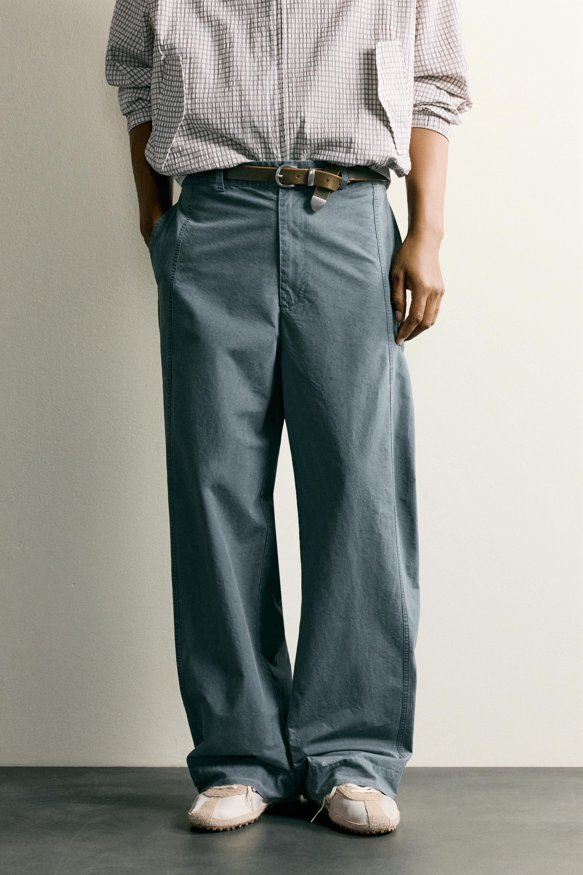 PANTALON DÉLAVÉ COUPE DÉCONTRACTÉE AVEC PATTES