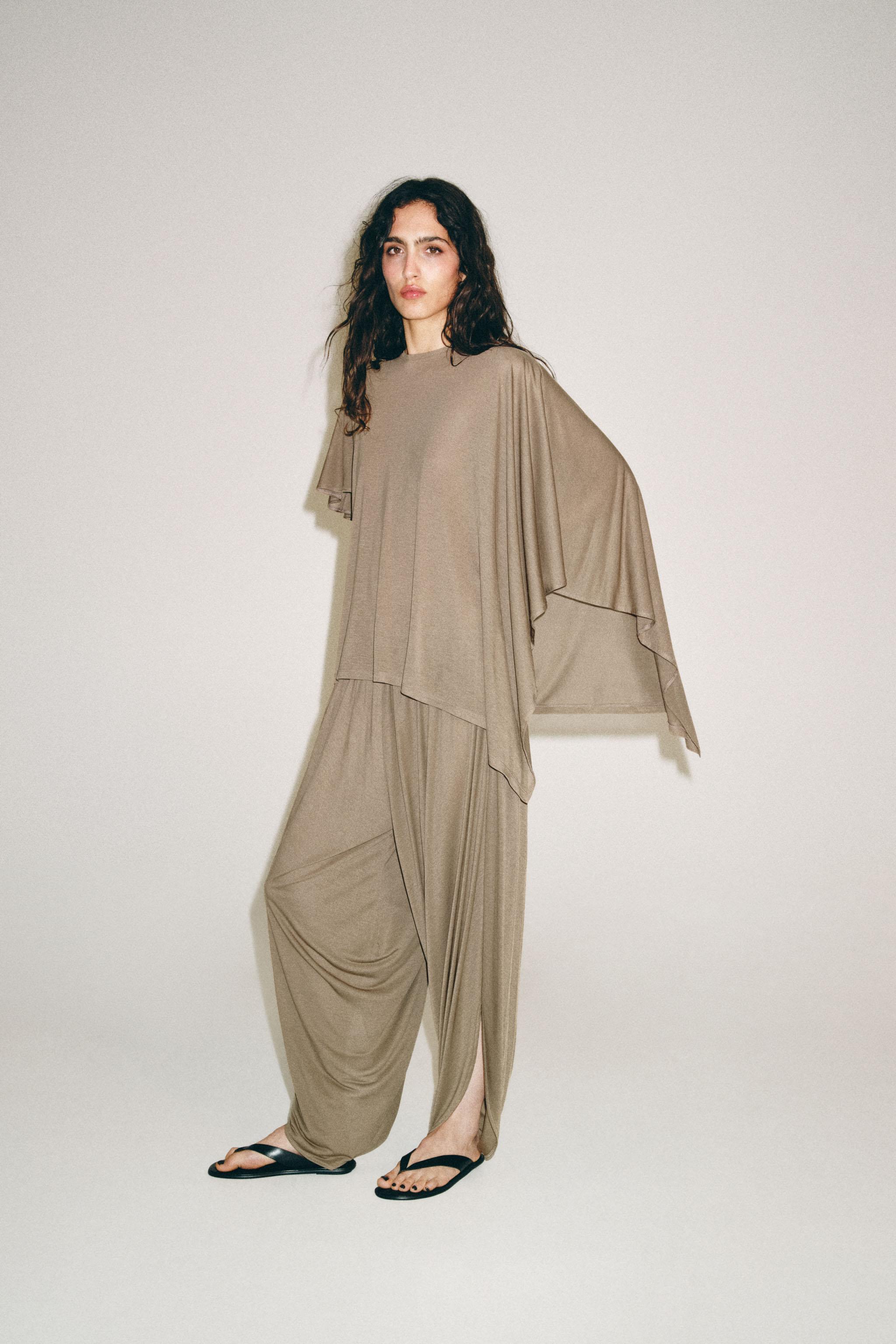 ASYMMETRIC CAPE TOP