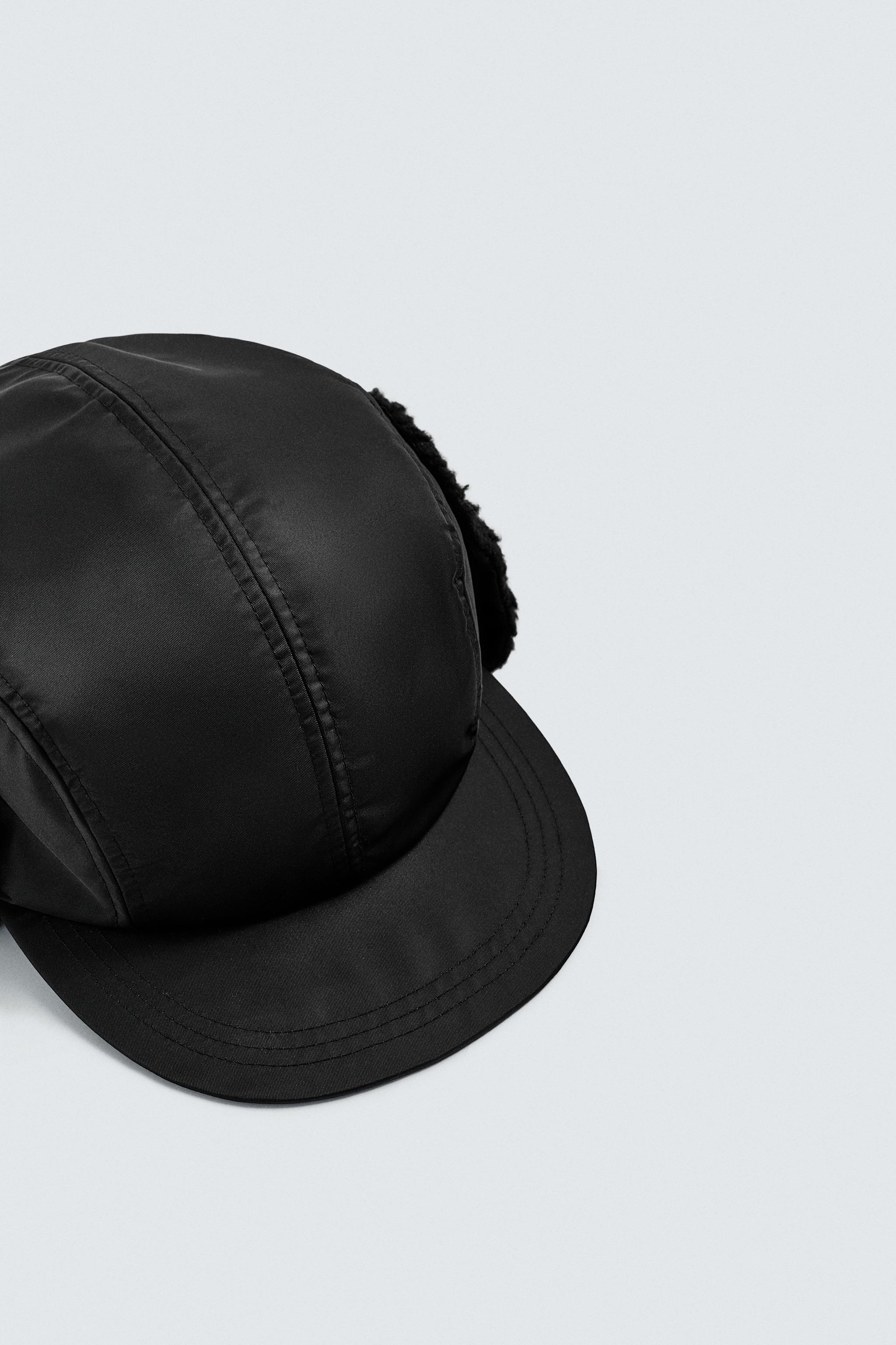 CASQUETTE TECHNIQUE AVEC CACHE-OREILLES EN IMITATION PEAU DE MOUTON