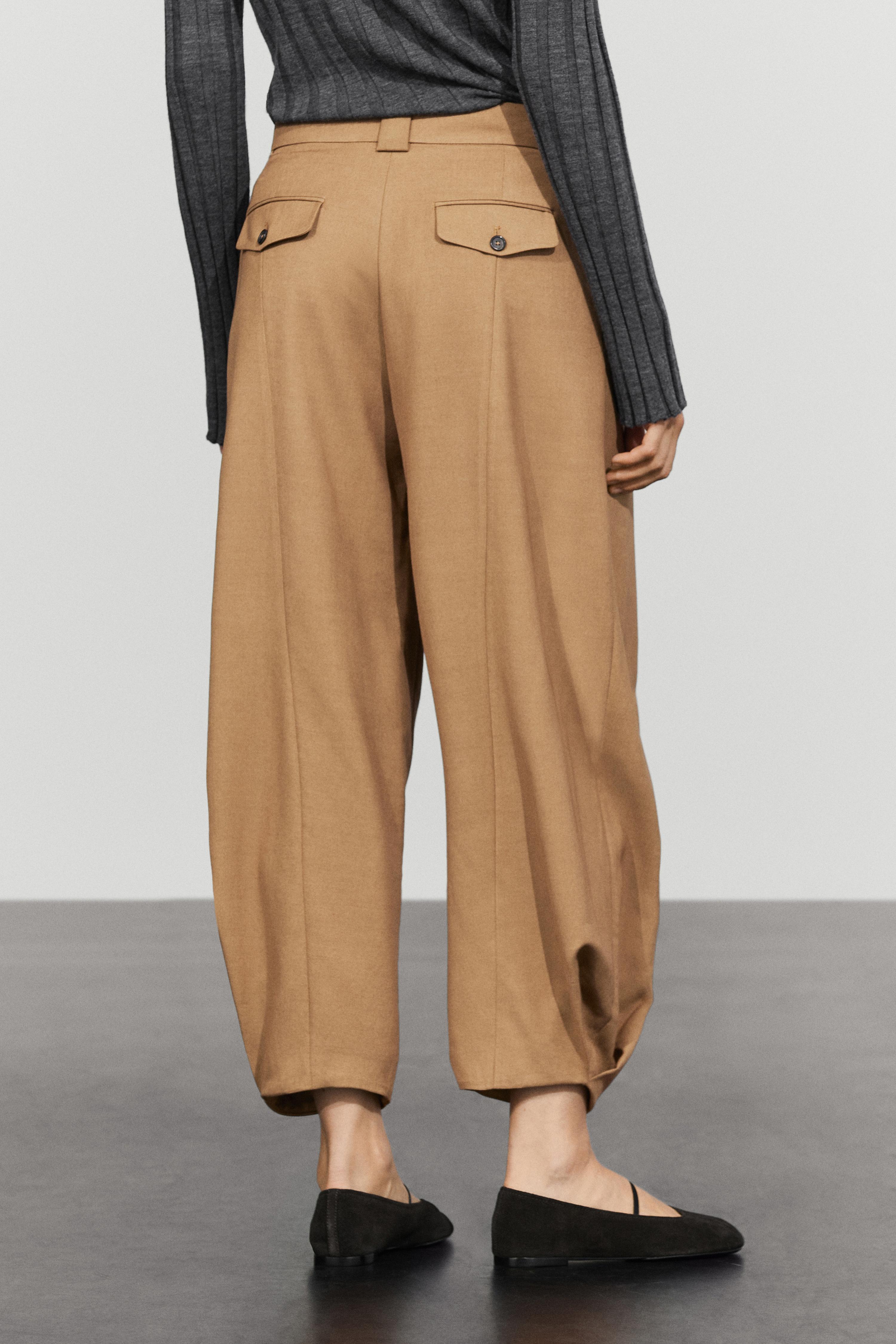Wool blend pants with pleated detail