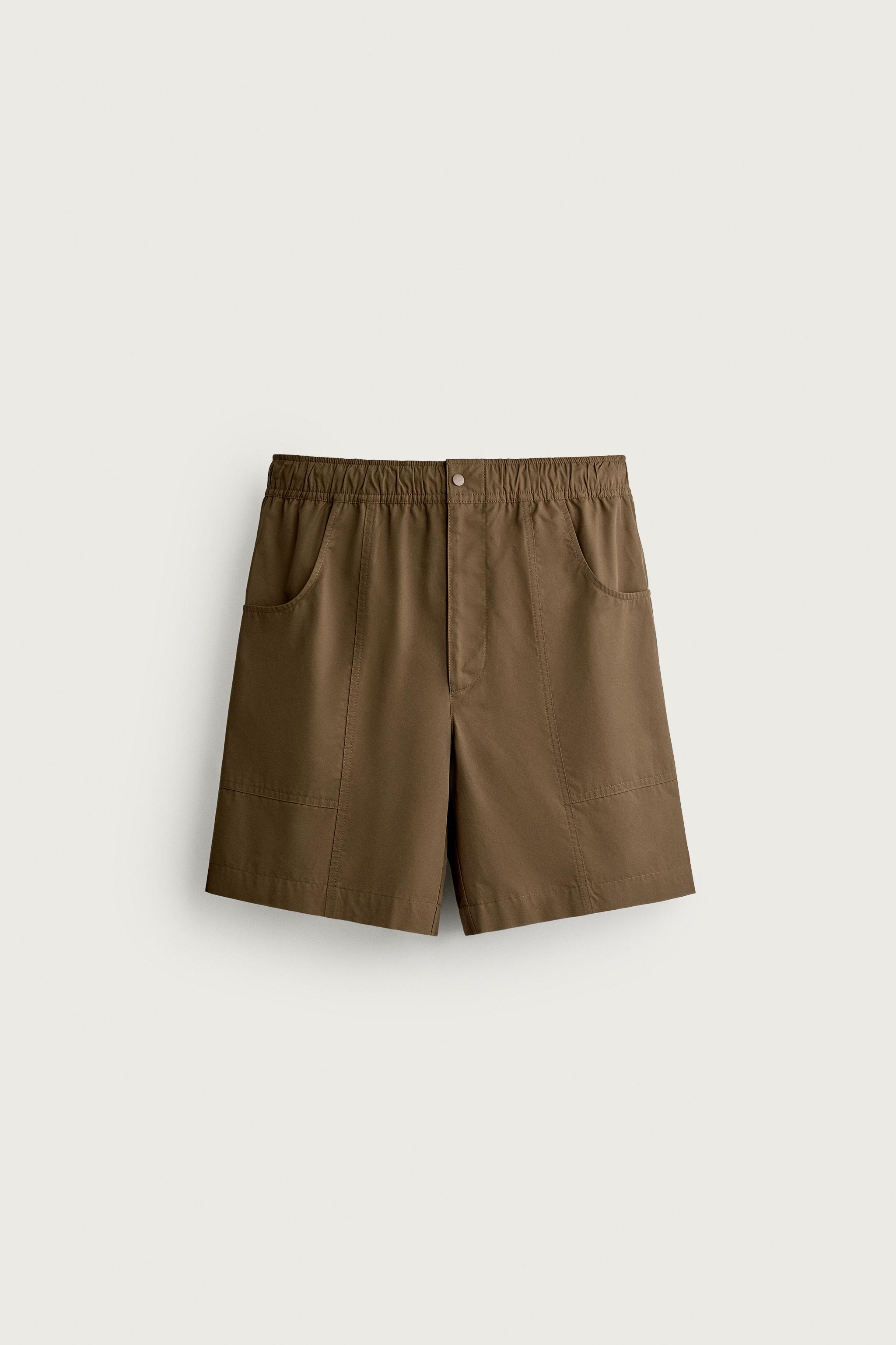 SEAMED SWIM SHORTS