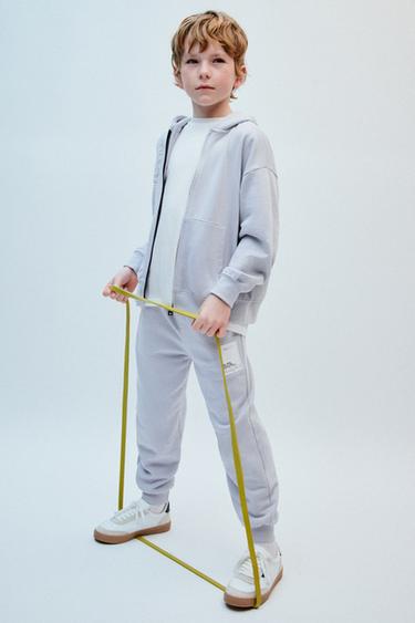 JOGGING TROUSERS WITH LABEL - Light grey by Zara