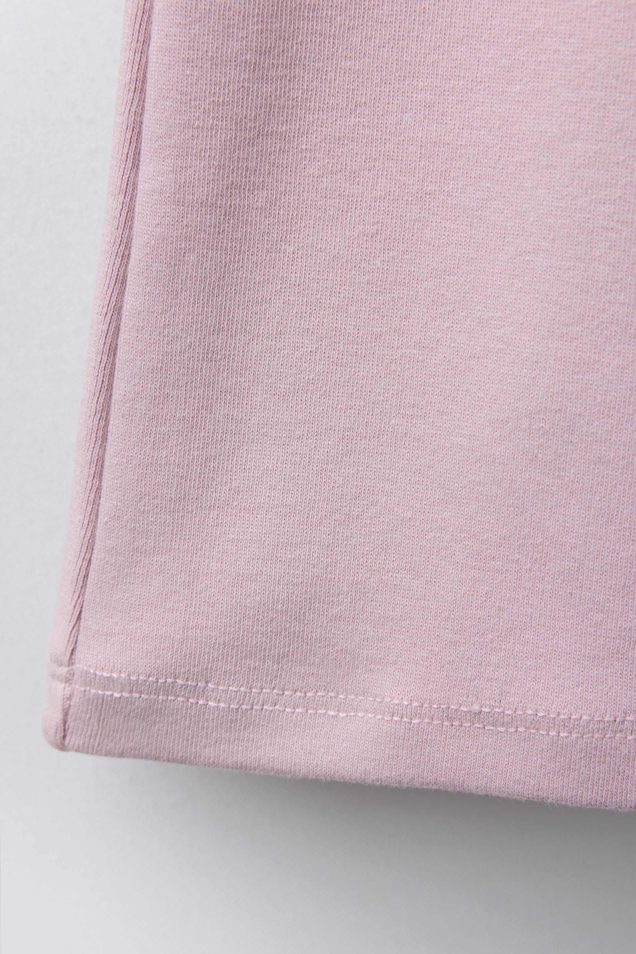 LEGGING FLARE INTERLOCK À ÉTIQUETTE