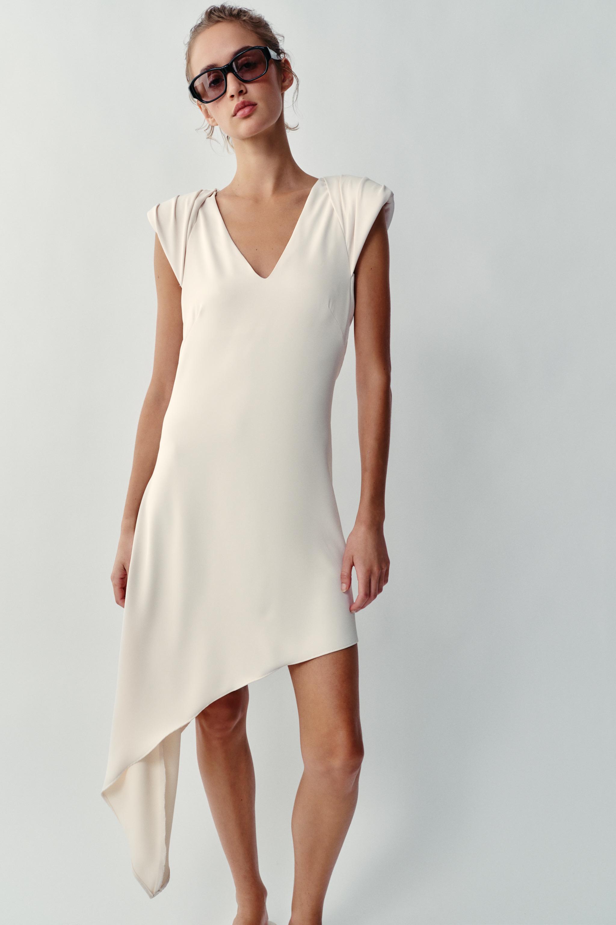 ASYMMETRIC SHORT DRESS WITH SHOULDER PADS