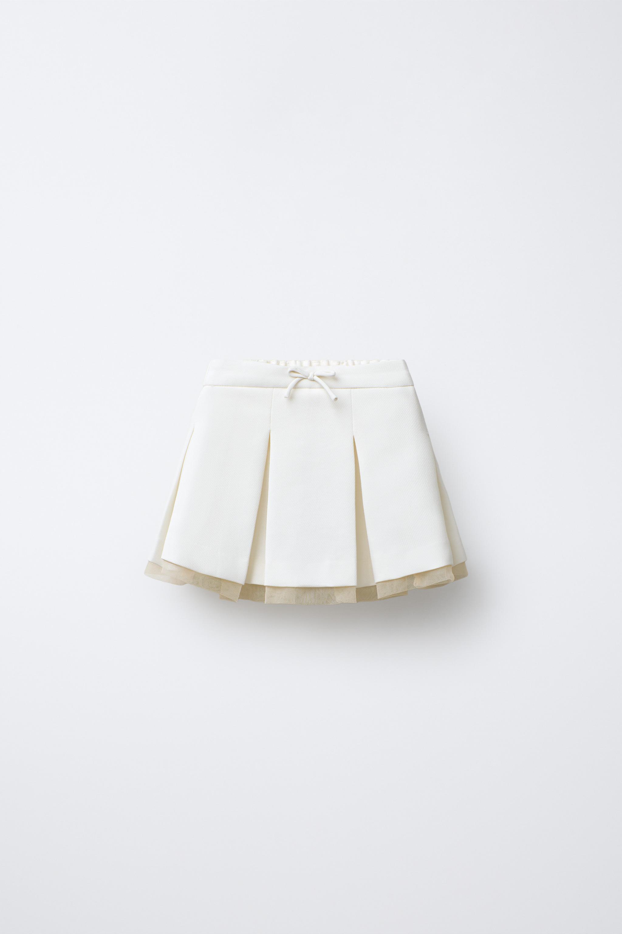 JUPE À PLIS PLATS AVEC TULLE AU BAS