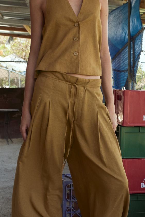 PANTALÓN ANCHO PINZAS CON LINO - Ocre de Zara - Imagen 0