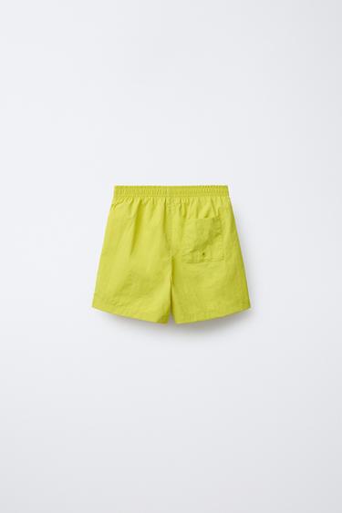 6-14 YEARS/ PLAIN SWIM BERMUDA SHORTS - Mustard by Zara - Image 1