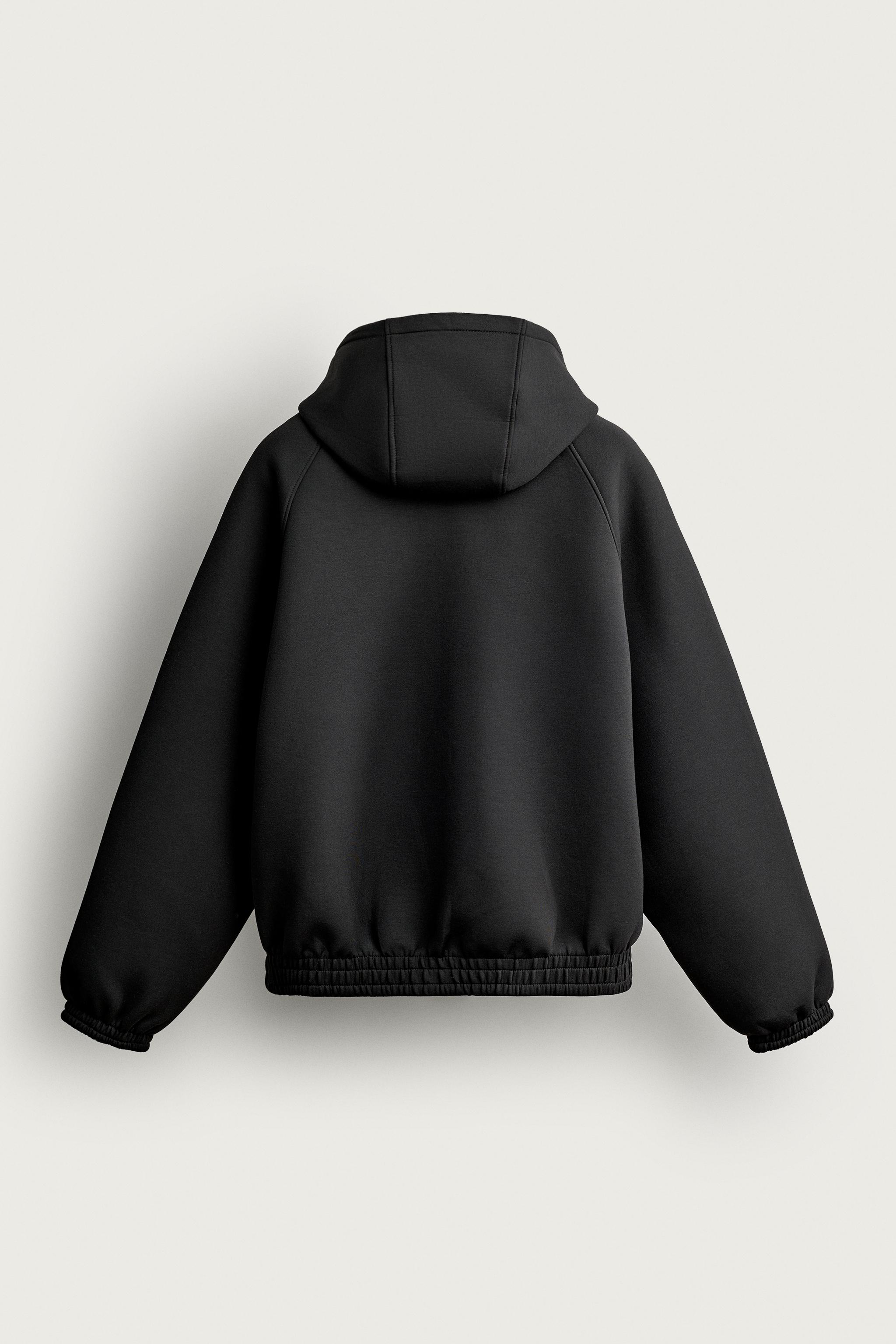 RELAXED-FIT TECHNICAL HOODED JACKET