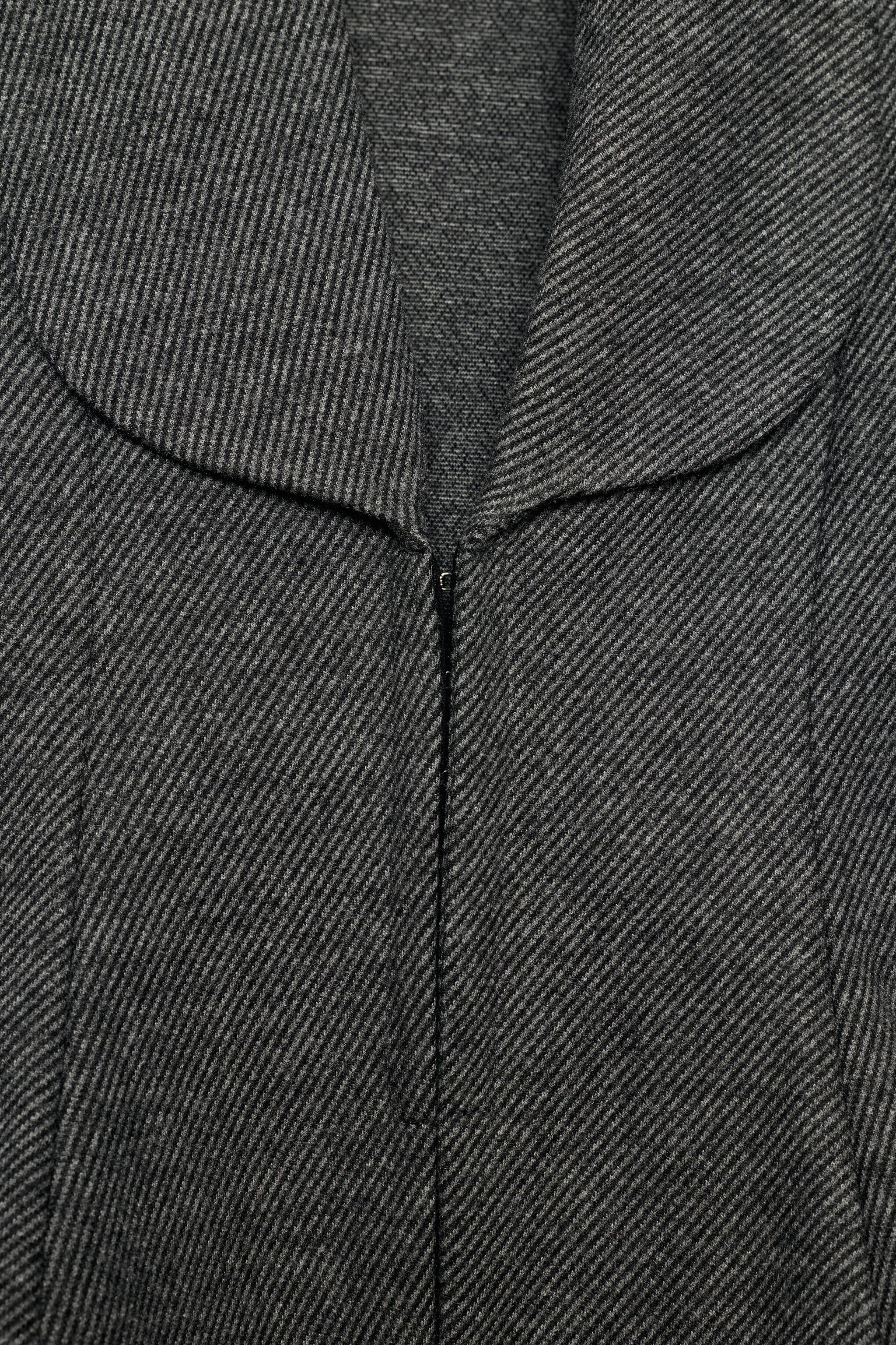 PEPLUM VEST