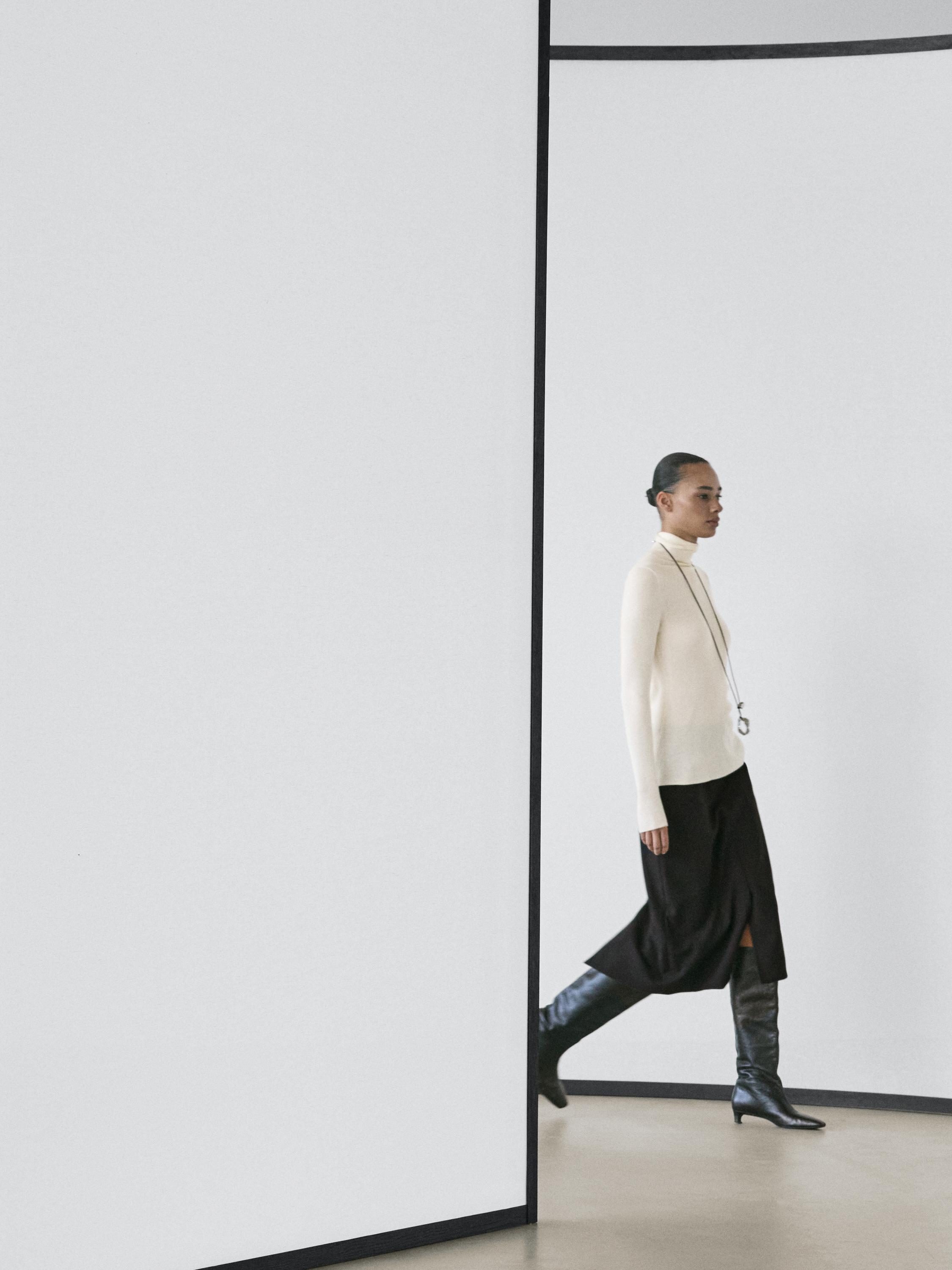 Straight fit wool blend midi skirt with slit