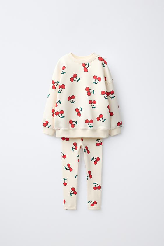 CONJUNTO JOGGING SUDADERA Y LEGGING ESTAMPADO CEREZAS - Crudo de Zara - Imagen 0