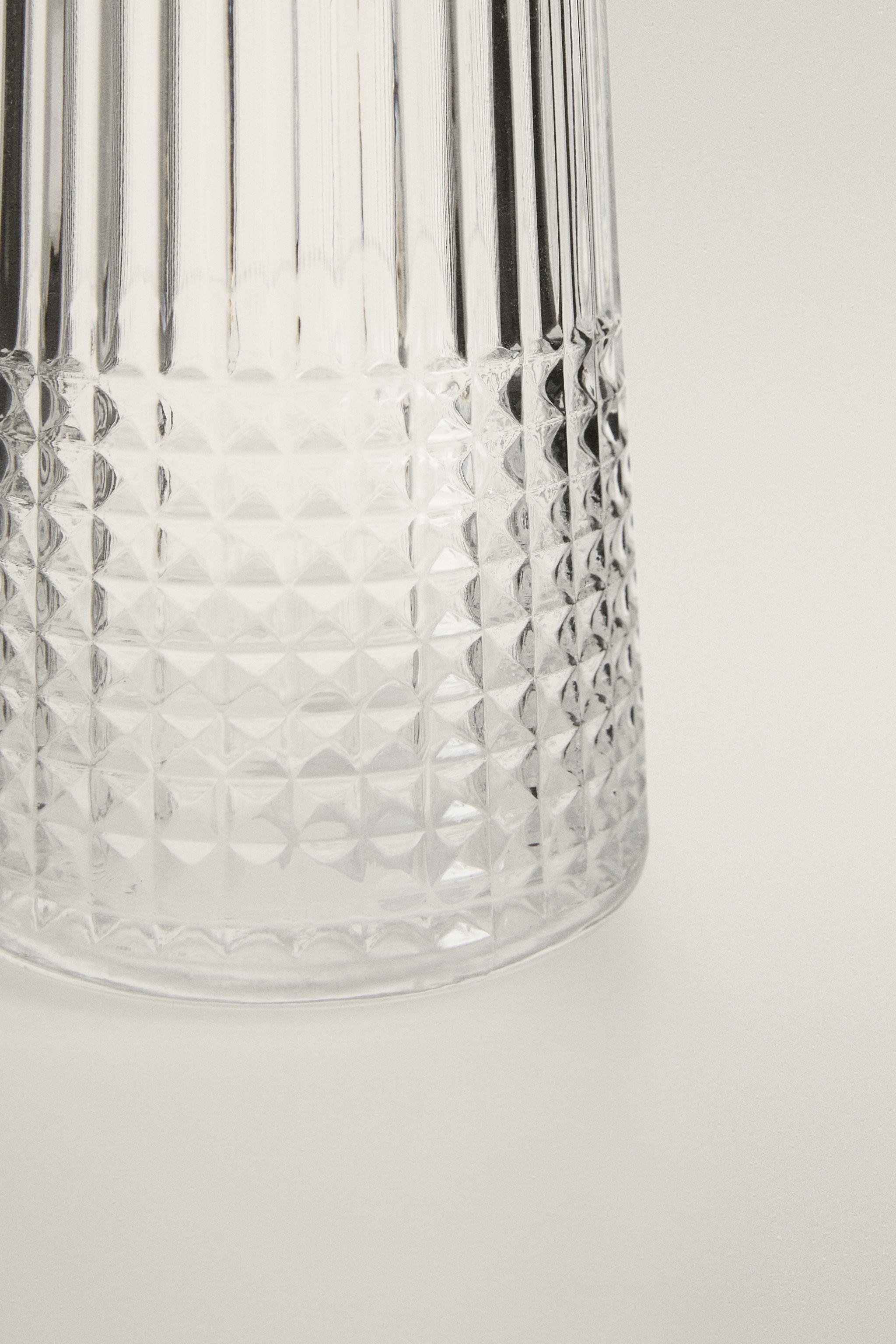 RAISED DESIGN GLASS BOTTLE