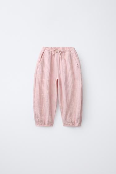 بنطلون BAGGY بملمس - وردي فاتح الخاص بـ Zara