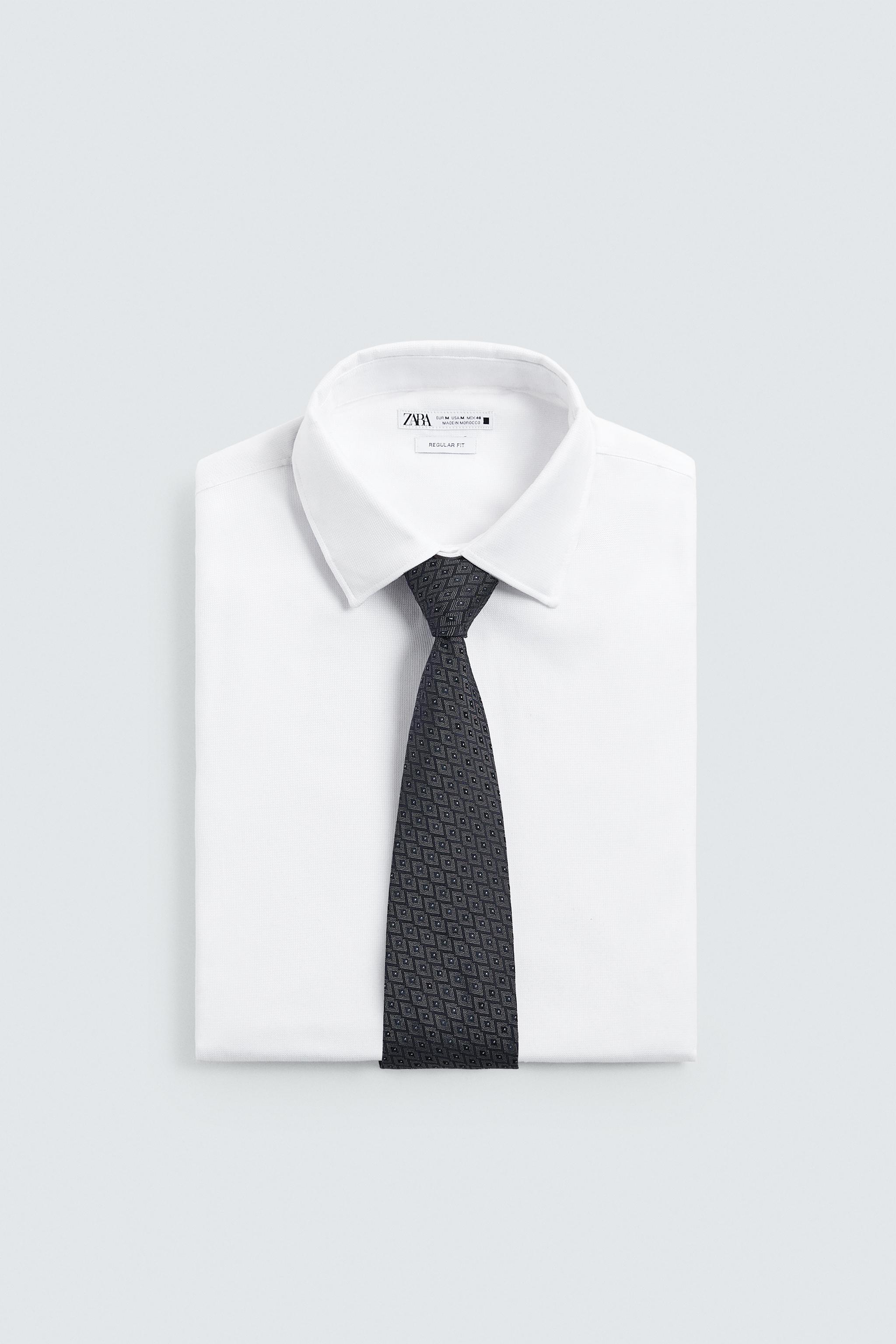 CRAVATE JACQUARD GÉOMÉTRIQUE 100% SOIE