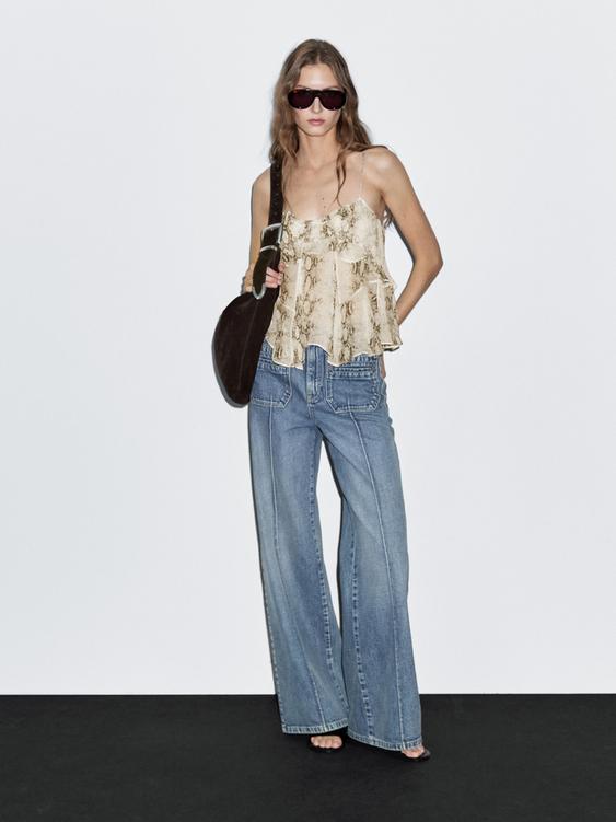 Ruffled snakeskin print top with gathered detail