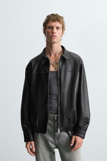 CAZADORA BOMBER EFECTO PIEL - Negro de Zara